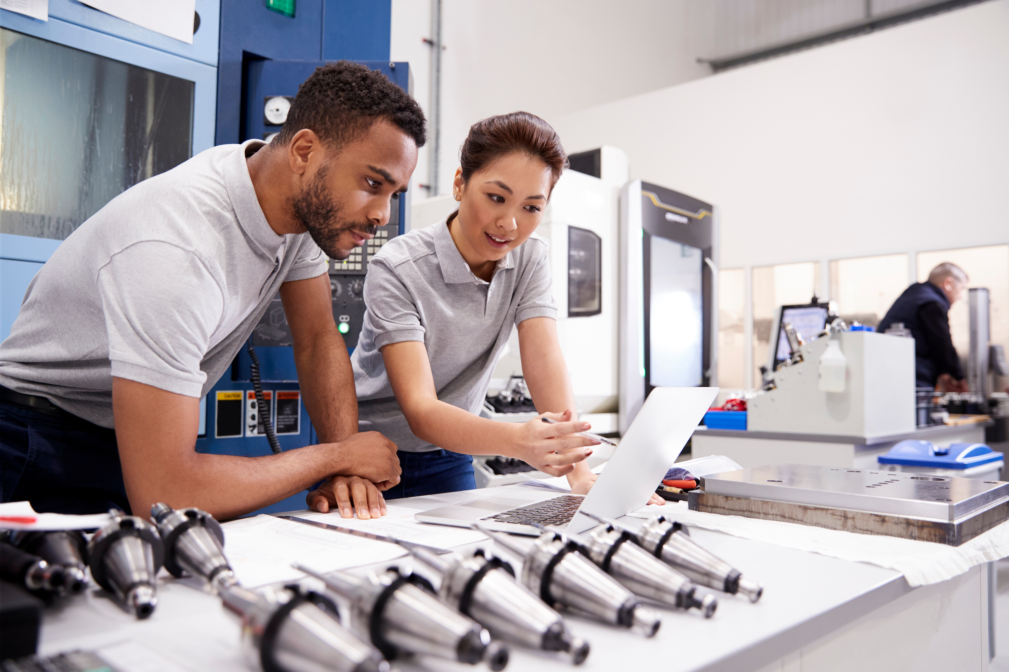 Two engineers working on a project